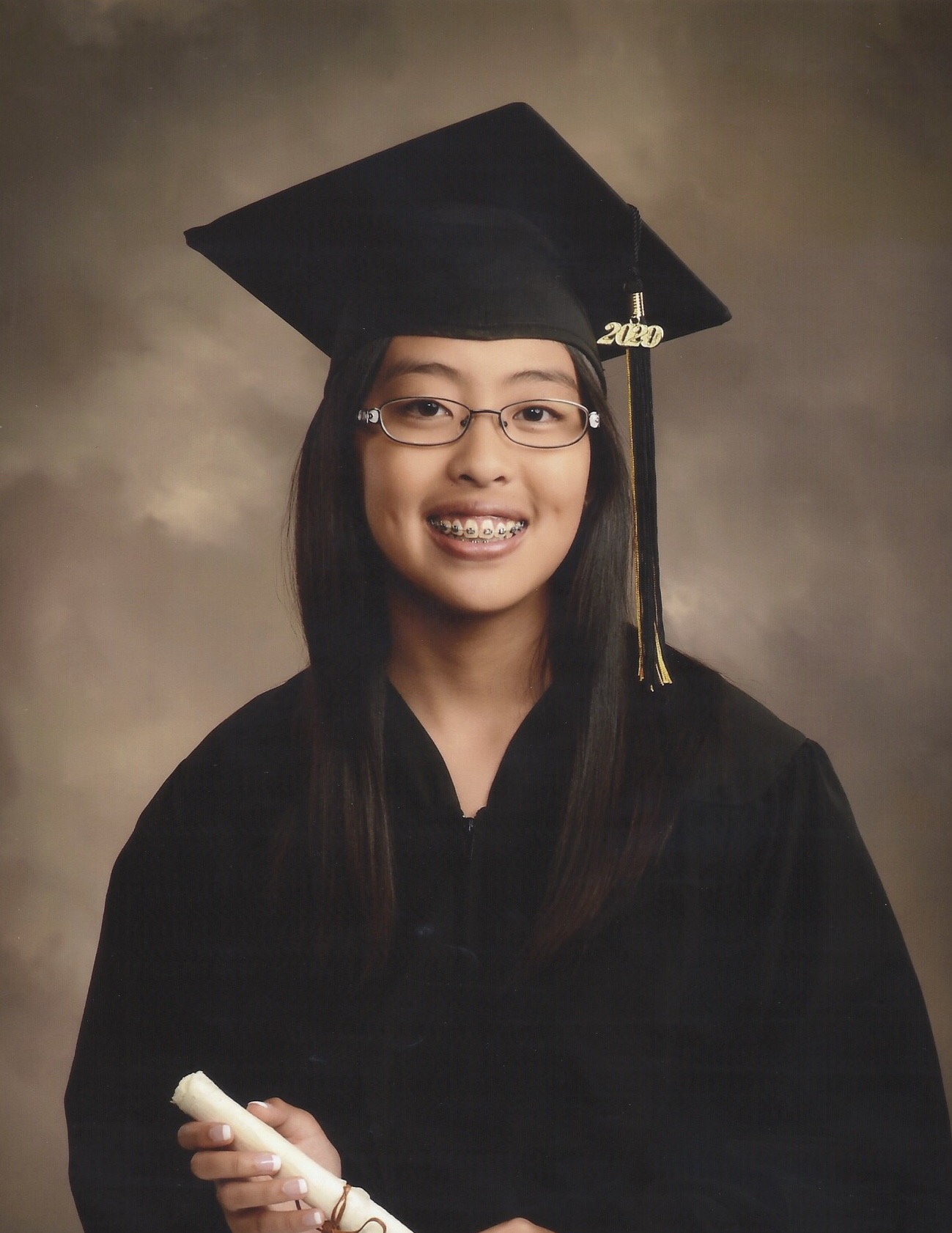 Student in cap and gown